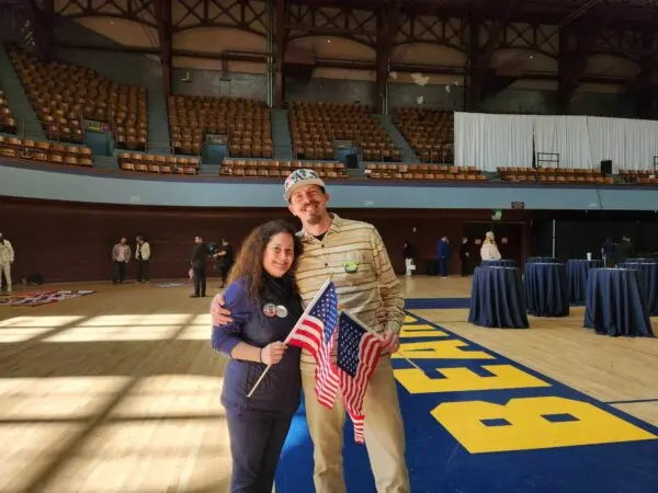 Joseph and Katie Sokolski- Spear attended Robert F. Kennedy Jr.'s announcement of Nicole Shanahan as his running mate in Oakland, Calif., on March 26, 2024. ( Jeff Louderback/The Epoch Times )