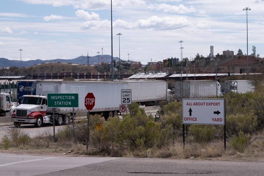 At the Nogales port of entry, trucks are idling in traffic.