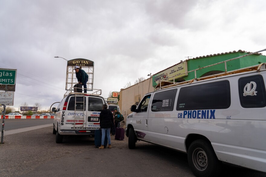 Drivers for the transportation service, Transporte Directo, pack up vans of people traveling from the U. S. Mexico border in Douglas, Ariz., to Tucson and Phoenix.