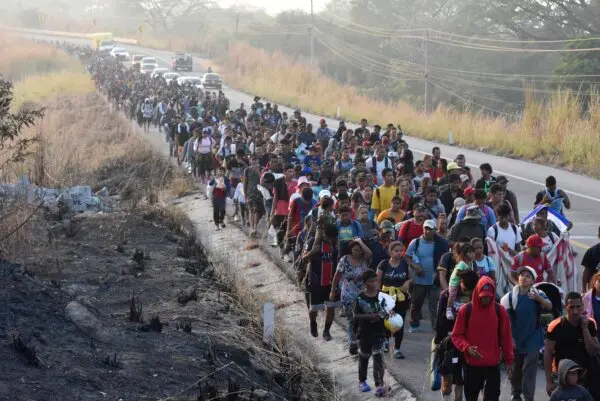 Illegal immigrants walk along the highway through Arriaga, Chiapas state in southern Mexico, on Jan. 8, 2024. ( Edgar H. Clemente/AP Photo )