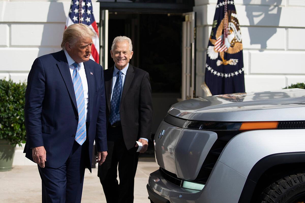 President Donald Trump and trade adviser Peter Navarro inspect the new Endurance all-electric delivery vehicle on the southern grass of the White House in Washington on September 28, 2020. ( Tasos Katopodis/Getty Images )